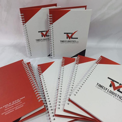 Red and white corporate branded notebooks